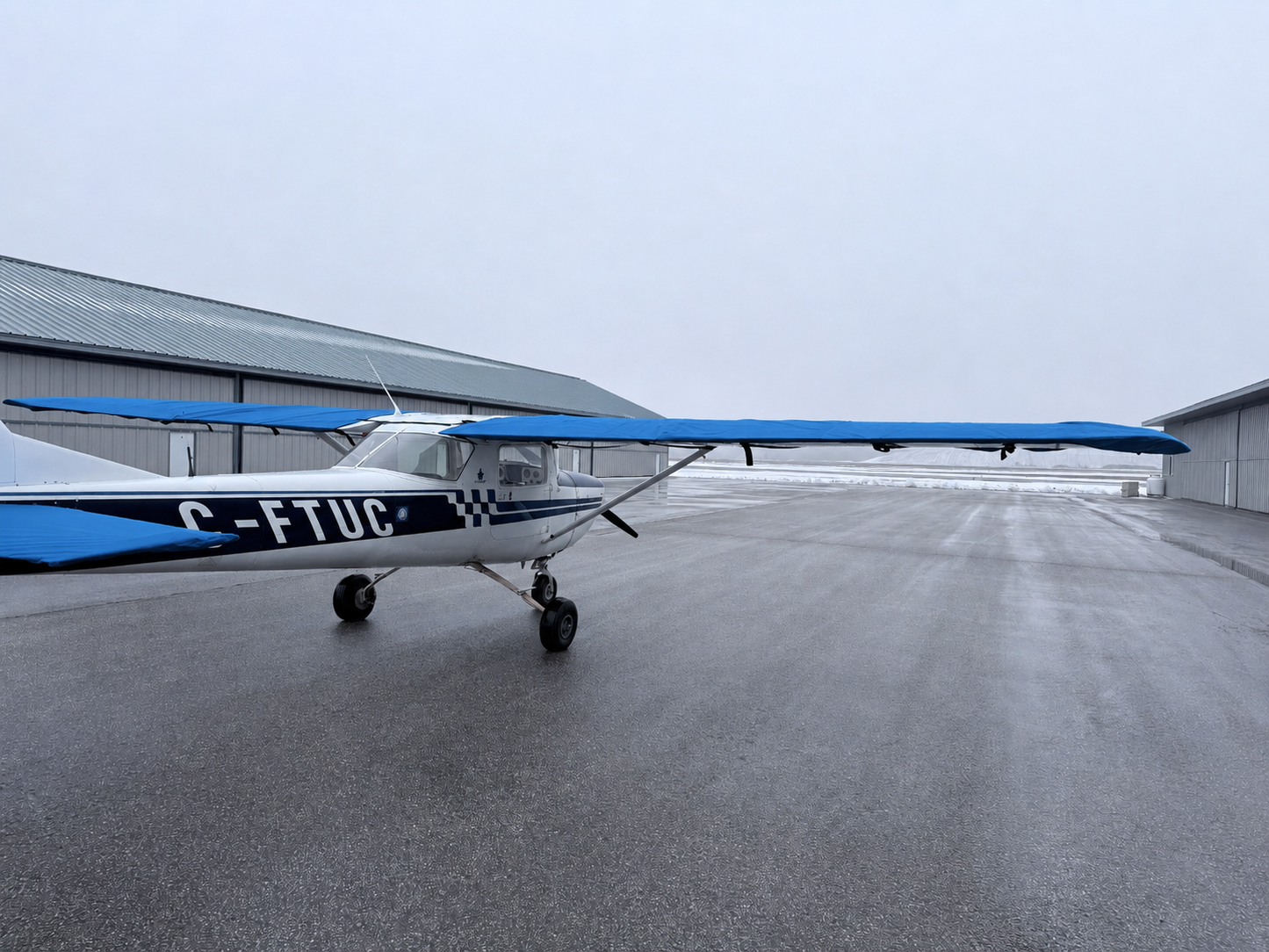 Cessna 150 aircraft with Mcovers all-weather wing and tail covers installed
